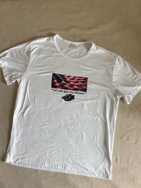Classic White Graphic Tee with American Flag and Quote